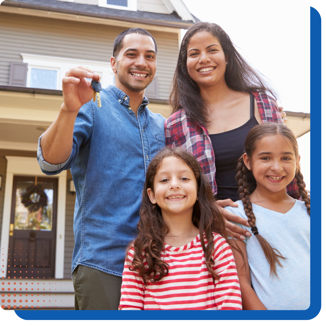 Family holding a house key