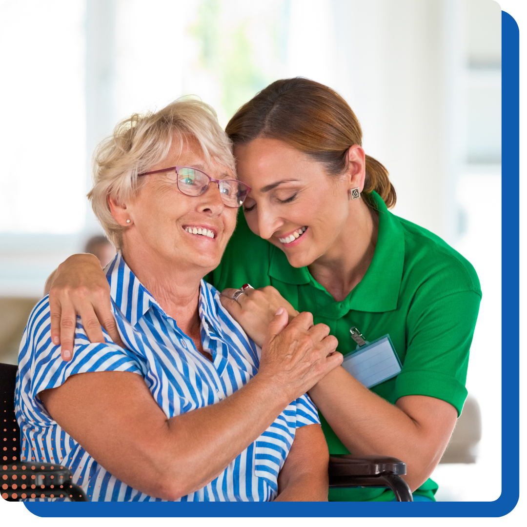 Social Worker hugging older woman